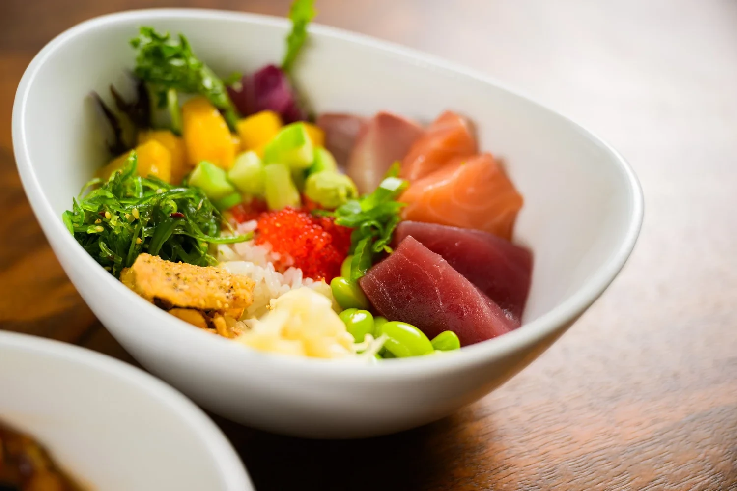 Sushi Boat fresh poke bowl with tuna and salmon